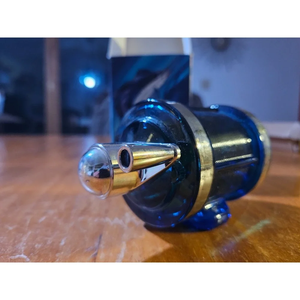 Vintage Avon The Angler Cologne Blue Fishing Reel Bottle FULL bottle. 1618